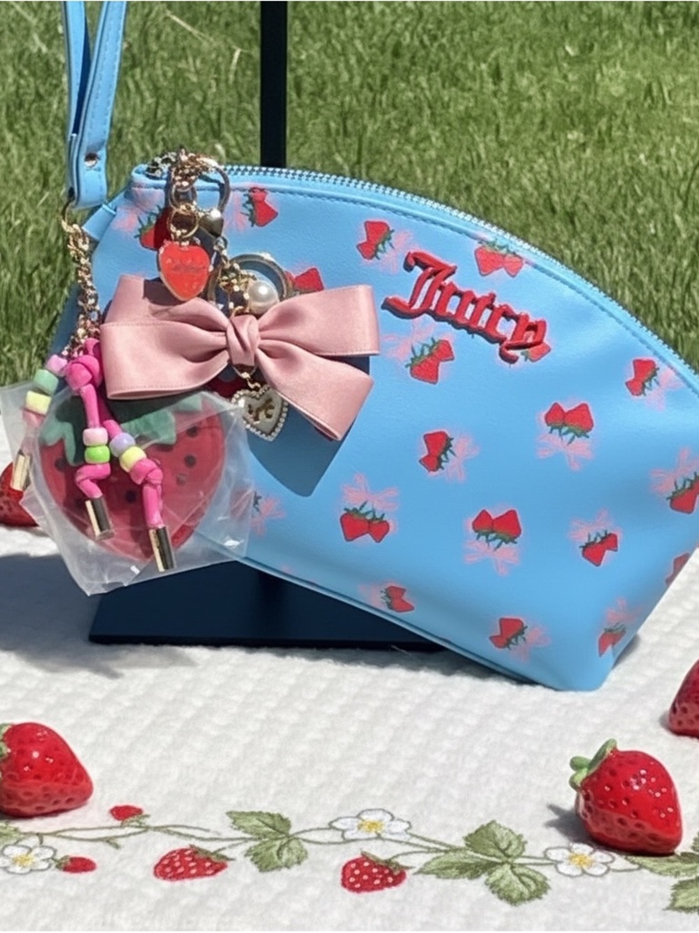 Juicy Couture Blue Strawberry Print Wristlet with Pink Bow and strawberry charm
